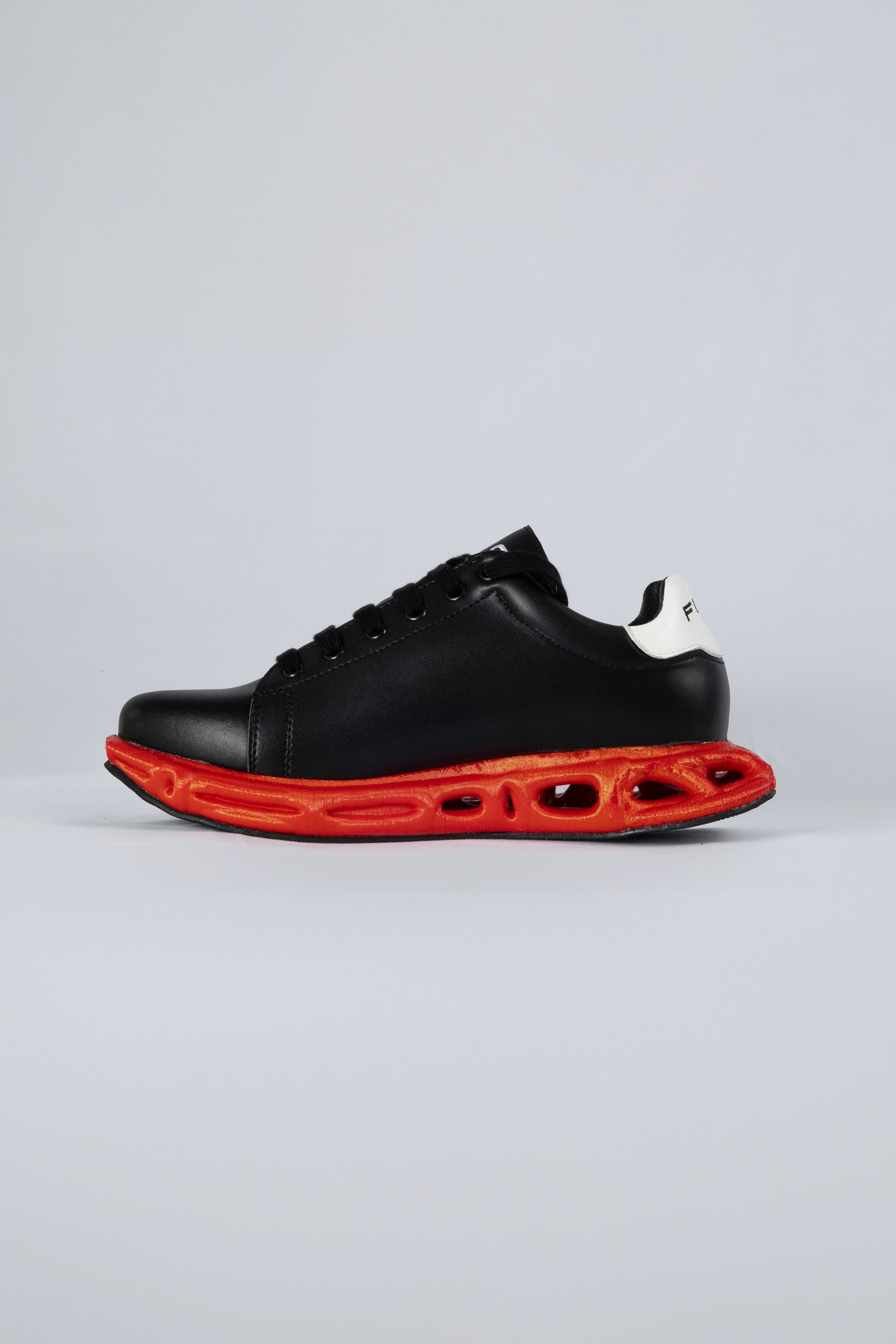 Un-Classic Negro suela Roja